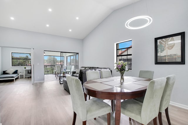 1102 Republic Ct, Deerfield Beach, FL 33442 - dining room with high vaulted ceiling, light wood-style floors, and recessed lighting