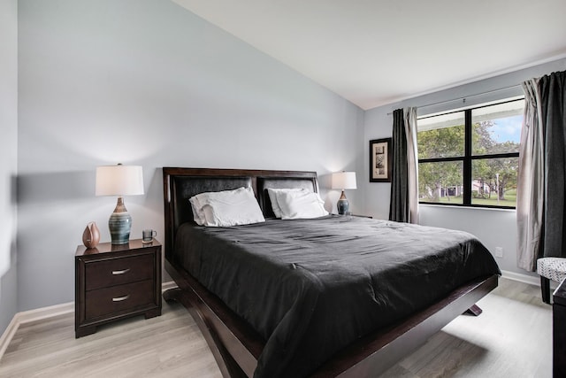 1102 Republic Ct, Deerfield Beach, FL 33442 - bedroom with vaulted ceiling and light wood-style floors