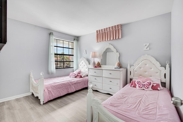 1102 Republic Ct, Deerfield Beach, FL 33442 - bedroom featuring wood finished floors and baseboards