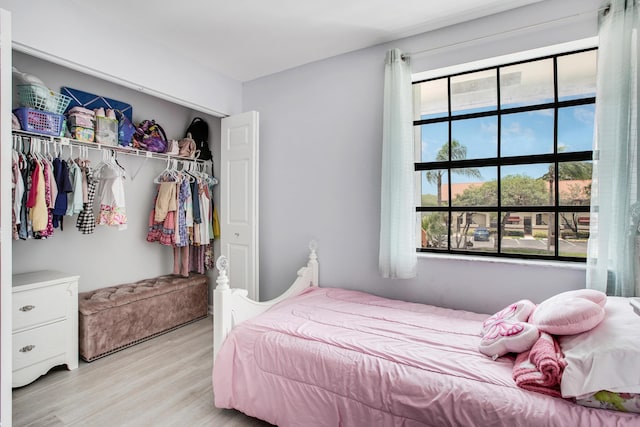 1102 Republic Ct, Deerfield Beach, FL 33442 - bedroom featuring a closet and wood finished floors