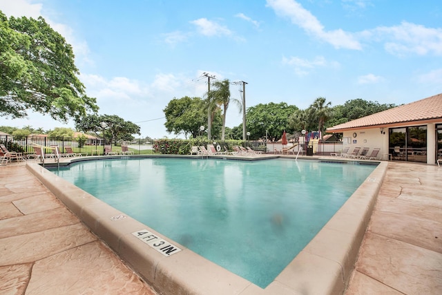 1102 Republic Ct, Deerfield Beach, FL 33442 - community pool with a patio area