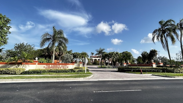 1102 Republic Ct, Deerfield Beach, FL 33442 - view of asphalt street with curbs, sidewalks, and traffic signs