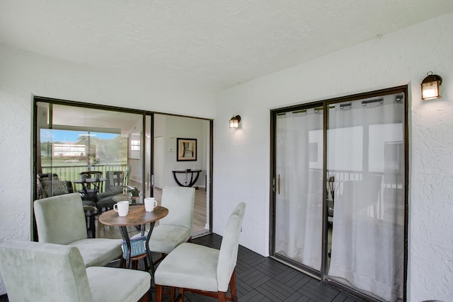 1102 Republic Ct, Deerfield Beach, FL 33442 - dining space with a textured ceiling and a textured wall