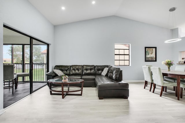 1102 Republic Ct, Deerfield Beach, FL 33442 - living room featuring light wood-style flooring, recessed lighting, and high vaulted ceiling