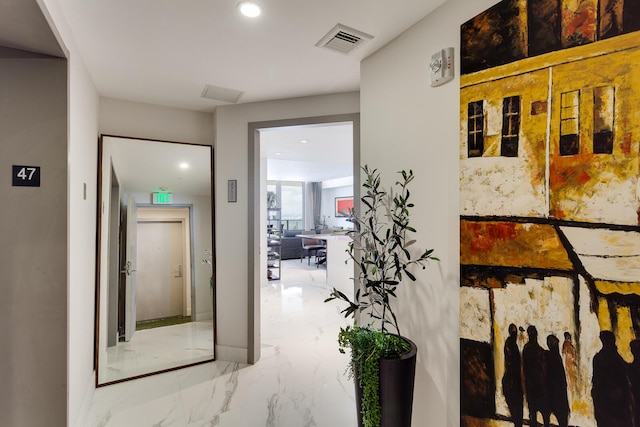 488 NE 18th St Unit 4711, Miami, FL 33132 - hallway featuring marble tiled flooring and recessed lighting