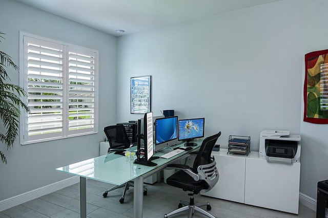 3165 Berkley Square Way, Vero Beach, FL 32966 - tiled office space featuring baseboards