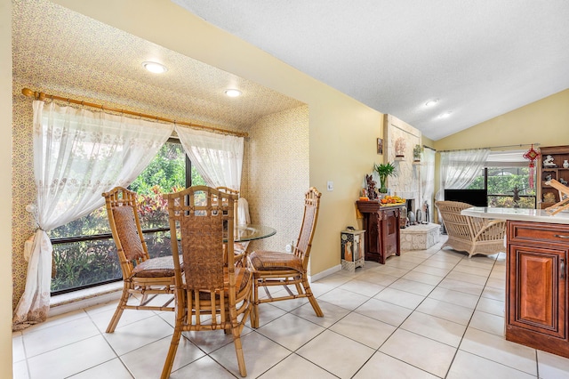 2029 Greenview Cove Dr, Wellington, FL 33414 - dining room with vaulted ceiling, light tile patterned floors, and recessed lighting
