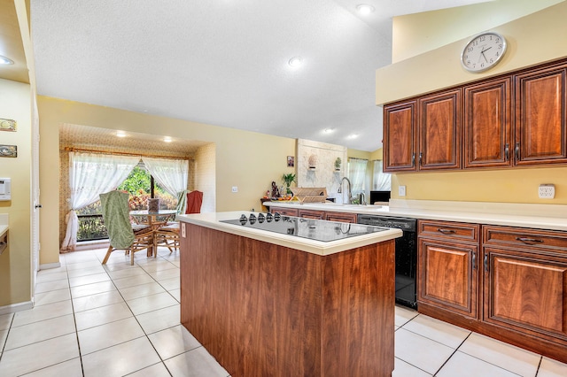 2029 Greenview Cove Dr, Wellington, FL 33414 - kitchen with black appliances, light countertops, a kitchen island, and light tile patterned floors