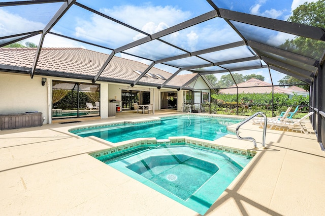 2029 Greenview Cove Dr, Wellington, FL 33414 - view of swimming pool featuring a patio, a ceiling fan, a pool with connected hot tub, and glass enclosure