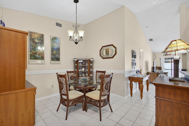 4640 Homestead Way Unit 39, West Palm Beach, FL 33417 - dining room featuring a chandelier, light tile patterned floors, and lofted ceiling