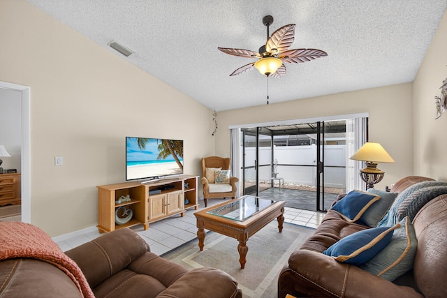 4640 Homestead Way Unit 39, West Palm Beach, FL 33417 - tiled living room with a textured ceiling, ceiling fan, and lofted ceiling