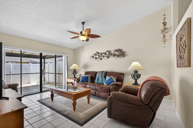 4640 Homestead Way Unit 39, West Palm Beach, FL 33417 - living room with a ceiling fan, light tile patterned floors, a textured ceiling, and vaulted ceiling