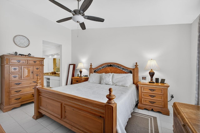 4640 Homestead Way Unit 39, West Palm Beach, FL 33417 - bedroom with light tile patterned floors, connected bathroom, and a ceiling fan
