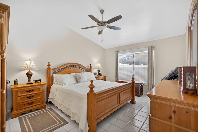 4640 Homestead Way Unit 39, West Palm Beach, FL 33417 - bedroom featuring vaulted ceiling, light tile patterned flooring, and ceiling fan