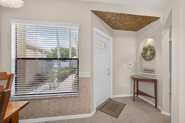 4640 Homestead Way Unit 39, West Palm Beach, FL 33417 - foyer entrance featuring light tile patterned flooring and baseboards