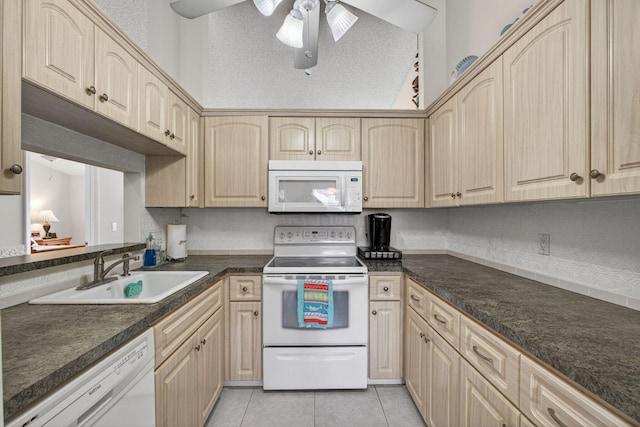 4640 Homestead Way Unit 39, West Palm Beach, FL 33417 - kitchen featuring white appliances, light brown cabinetry, and ceiling fan