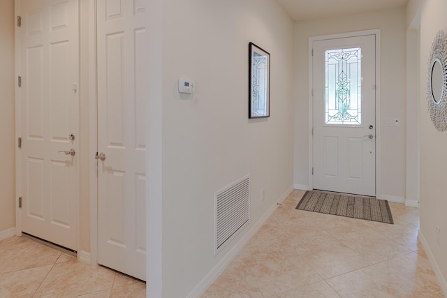 649 SE Monteiro Dr, Port Saint Lucie, FL 34984 - entrance foyer with light tile patterned floors