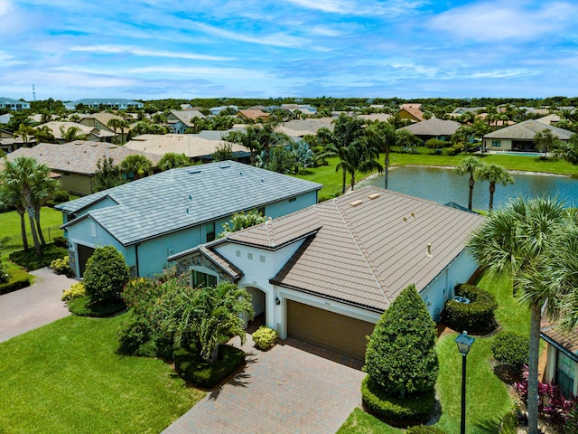649 SE Monteiro Dr, Port Saint Lucie, FL 34984 - aerial perspective of suburban area featuring a nearby body of water