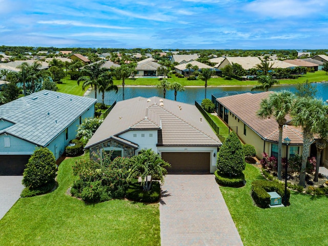 649 SE Monteiro Dr, Port Saint Lucie, FL 34984 - aerial view of residential area with a large body of water