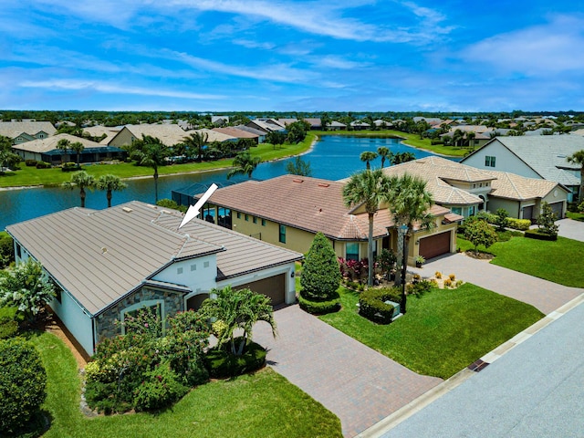649 SE Monteiro Dr, Port Saint Lucie, FL 34984 - aerial view of residential area with a nearby body of water