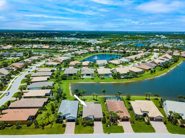 649 SE Monteiro Dr, Port Saint Lucie, FL 34984 - aerial view of residential area featuring a large body of water
