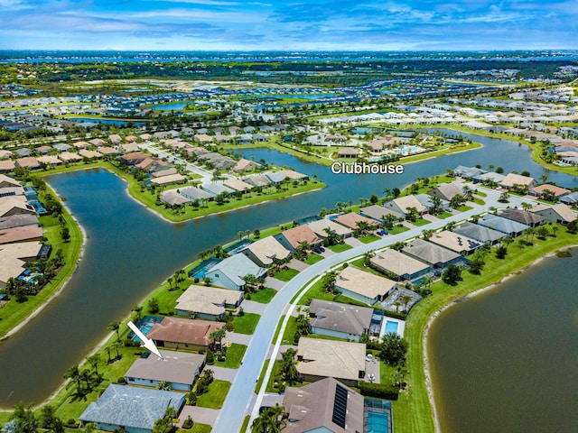 649 SE Monteiro Dr, Port Saint Lucie, FL 34984 - aerial perspective of suburban area with a nearby body of water