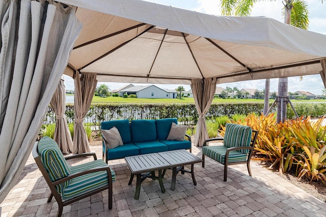 649 SE Monteiro Dr, Port Saint Lucie, FL 34984 - view of patio with a gazebo and outdoor lounge area