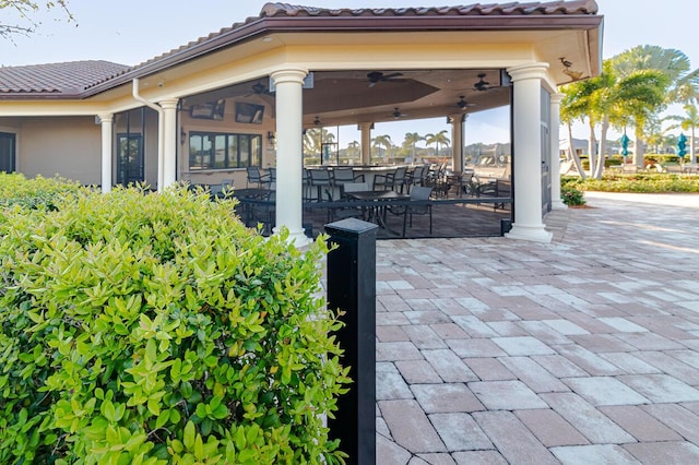 649 SE Monteiro Dr, Port Saint Lucie, FL 34984 - view of patio / terrace featuring a ceiling fan
