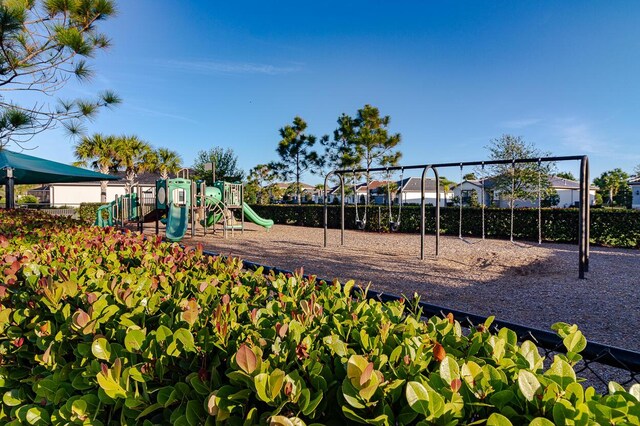 649 SE Monteiro Dr, Port Saint Lucie, FL 34984 - view of communal playground