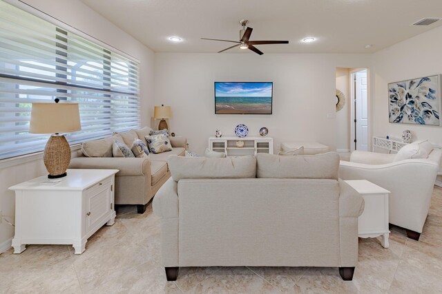 649 SE Monteiro Dr, Port Saint Lucie, FL 34984 - living room featuring ceiling fan and recessed lighting