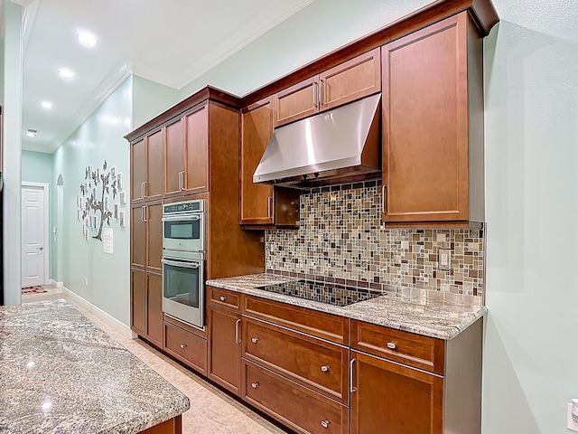 780 SW Fortunella Cir SW, Vero Beach, FL 32968 - kitchen with under cabinet range hood, black electric stovetop, crown molding, decorative backsplash, and light stone countertops