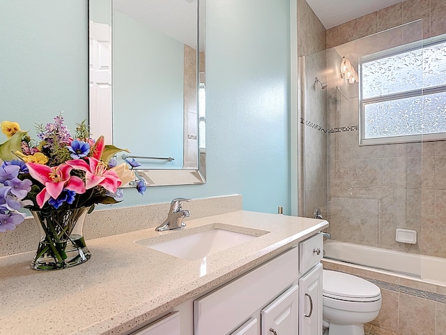 780 SW Fortunella Cir SW, Vero Beach, FL 32968 - bathroom featuring vanity and tiled shower / bath combo