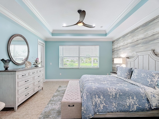 780 SW Fortunella Cir SW, Vero Beach, FL 32968 - bedroom featuring a tray ceiling, crown molding, ceiling fan, and light tile patterned flooring