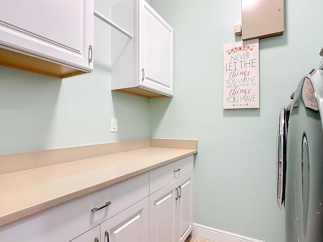 780 SW Fortunella Cir SW, Vero Beach, FL 32968 - kitchen featuring white cabinets and light countertops