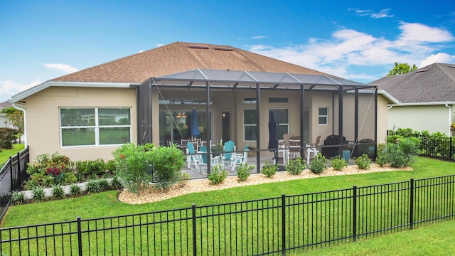 780 SW Fortunella Cir SW, Vero Beach, FL 32968 - back of property with a fenced backyard, stucco siding, a patio area, and glass enclosure