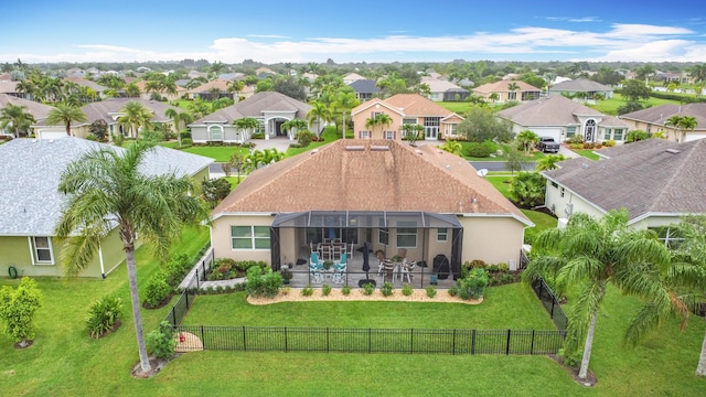 780 SW Fortunella Cir SW, Vero Beach, FL 32968 - back of house featuring a fenced backyard, a residential view, a patio area, and stucco siding