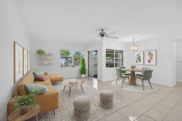 5791 Spindle Palm Ct Unit D, Delray Beach, FL 33484 - living area featuring a chandelier, light tile patterned floors, and ceiling fan