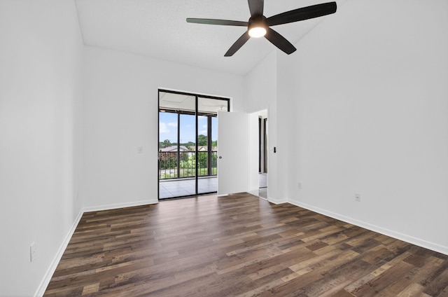 5235 Europa Dr Unit K, Boynton Beach, FL 33437 - empty room featuring wood finished floors, a ceiling fan, and high vaulted ceiling