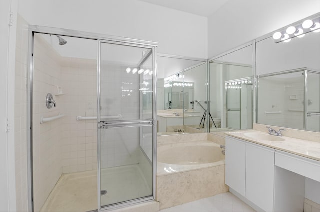 5235 Europa Dr Unit K, Boynton Beach, FL 33437 - bathroom with a garden tub, a stall shower, vanity, and tile patterned flooring