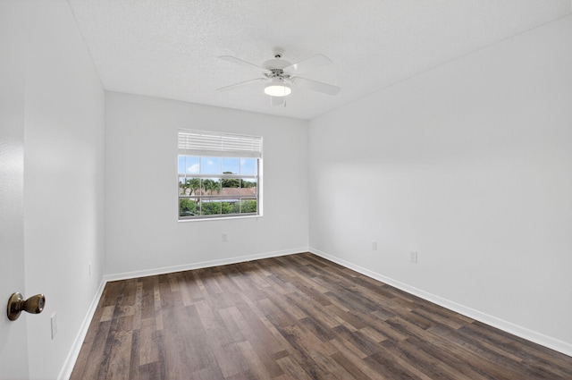 5235 Europa Dr Unit K, Boynton Beach, FL 33437 - spare room featuring dark wood-type flooring and a ceiling fan