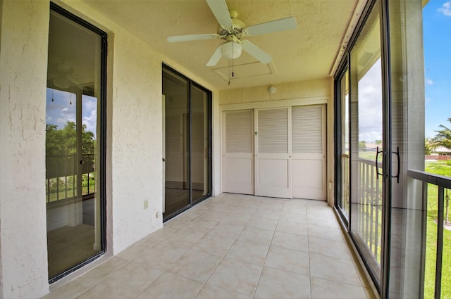 5235 Europa Dr Unit K, Boynton Beach, FL 33437 - unfurnished sunroom featuring a ceiling fan