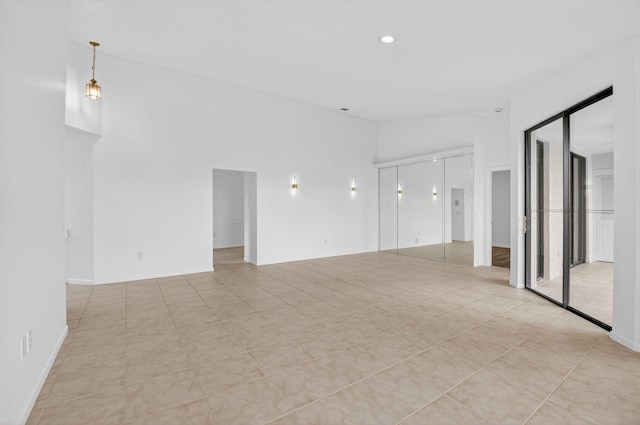 5235 Europa Dr Unit K, Boynton Beach, FL 33437 - unfurnished room featuring light tile patterned floors and recessed lighting