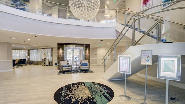 5235 Europa Dr Unit K, Boynton Beach, FL 33437 - building lobby with stairs and a high ceiling