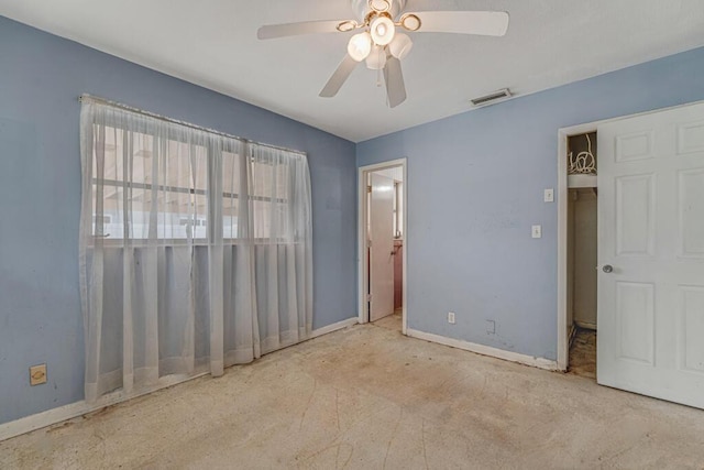 4840 Pineaire Ln, West Palm Beach, FL 33417 - unfurnished bedroom with baseboards and ceiling fan