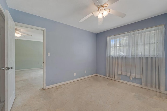 4840 Pineaire Ln, West Palm Beach, FL 33417 - empty room with a ceiling fan and unfinished concrete floors