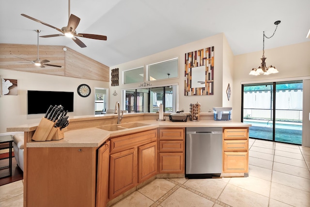 3003 SW Seaboard Ave, Palm City, FL 34990 - kitchen featuring stainless steel dishwasher, open floor plan, light tile patterned floors, light countertops, and a ceiling fan
