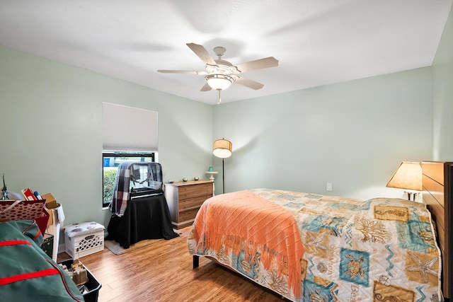 3003 SW Seaboard Ave, Palm City, FL 34990 - bedroom featuring wood finished floors and ceiling fan