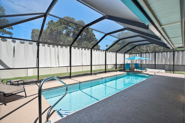 3003 SW Seaboard Ave, Palm City, FL 34990 - swimming pool featuring a fenced backyard, a patio area, and a lanai