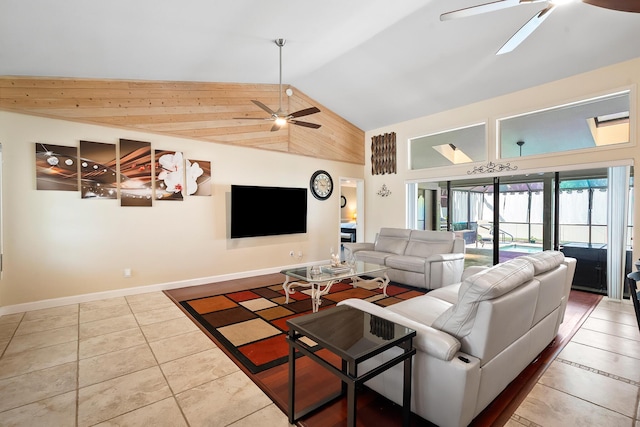 3003 SW Seaboard Ave, Palm City, FL 34990 - tiled living room with ceiling fan and high vaulted ceiling