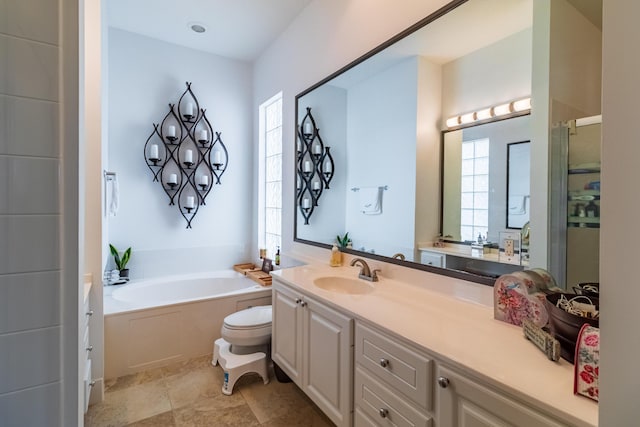 11355 SW Rockingham Dr, Port Saint Lucie, FL 34987 - bathroom with vanity, a garden tub, and a stall shower